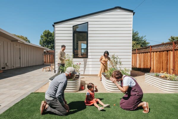 Jackie and Dan built an Abodu One outside their San Jose home. When their parents are not visiting, they use the ADU as a home office. The model here is pictured with gutters that run along the roof line, an add-on available for purchase with every model.