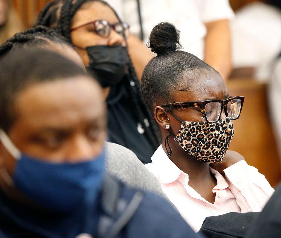 Avonnie Dorsett, girlfriend of Marquis Simmons, weeps as details of the murder are read during an arraignment on July 12, 2021 for Myles King, 21, the man accused of killing Simmons on July 10 at his Milton home.