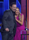 Lee Brice, left, and Carly Pearce accept the award for single of the year for "I Hope You're Happy Now" at the 56th annual Academy of Country Music Awards on Sunday, April 18, 2021, at the Grand Ole Opry in Nashville, Tenn. (AP Photo/Mark Humphrey)