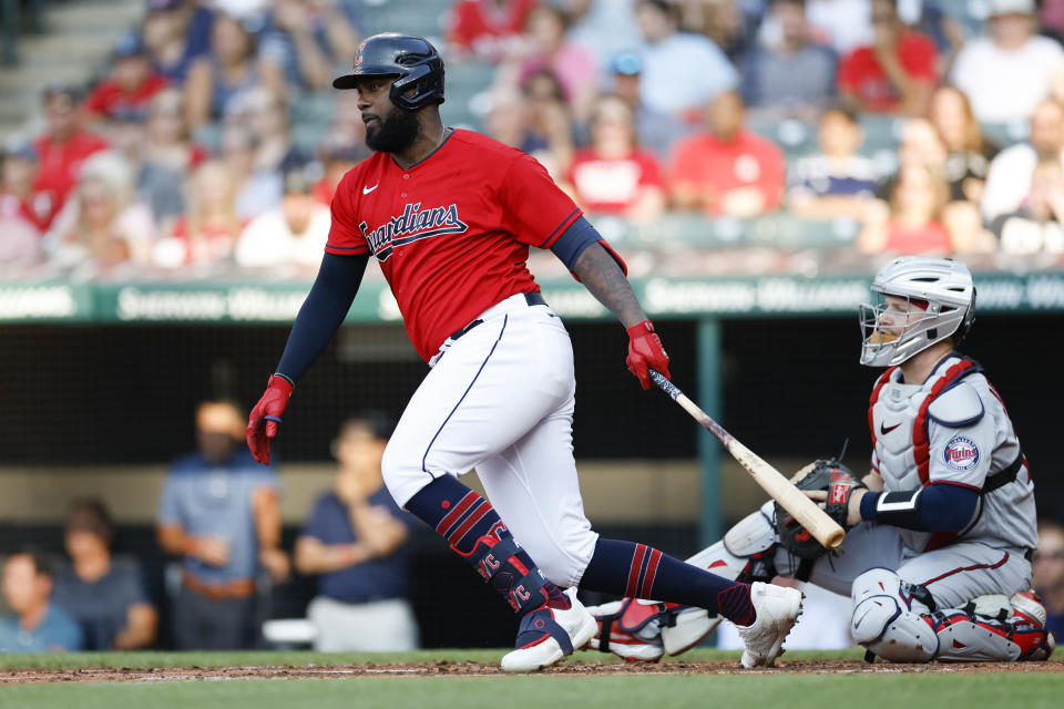 Cleveland Guardians' Franmil Reyes grounds into a forceout against the Minnesota Twins during the first inning of a baseball game Wednesday, June 29, 2022, in Cleveland. A run scored on the play. (AP Photo/Ron Schwane)