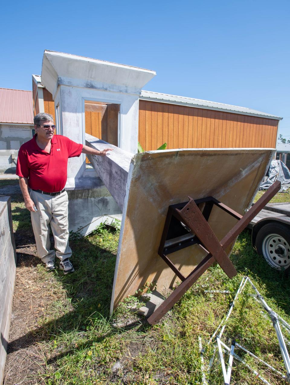 The Rev. Eddie LaFountain stands next to the steeple that was destroyed during Hurricane Michael as he talks about the ongoing reconstruction at the First Baptist Church of Mexico Beach. The church was severely damaged when the hurricane hit in October 2018.