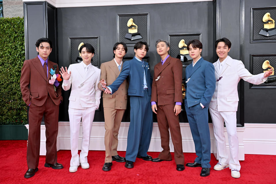 V, Suga, Jin, Jungkook, RM, Jimin and J-Hope of BTS attends the 64th Annual GRAMMY Awards at MGM Grand Garden Arena on April 03, 2022 in Las Vegas, Nevada