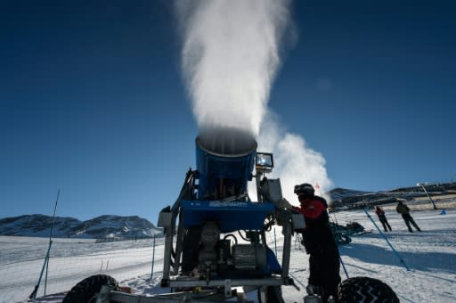 A cannon sprays artifical snow on a ski slope at El Colorado skiing center, in the Andes, some 30 km from Santiago