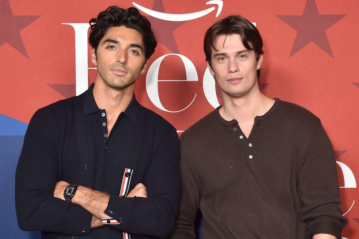 <p>Gregg Deguire/January Images/Shutterstock</p> Taylor Zakhar Perez and Nicholas Galitzine at Red, White & Royal Blue screening