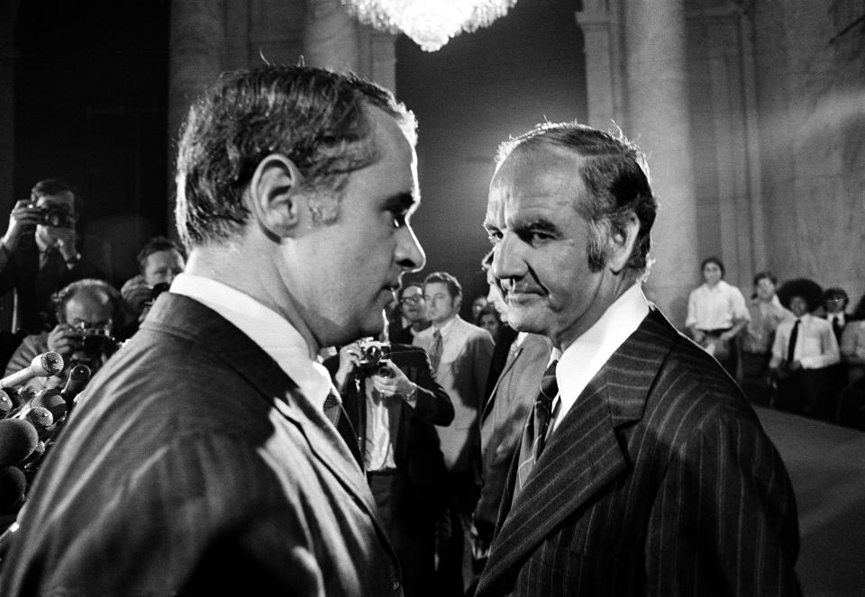 Aug. 1, 1972 fie photo, following a three-hour long closed meeting in Washington,, Sen. Thomas Eagleton, left, and Sen. George McGovern, right, head in different directions, after McGovern announced that Eagleton was stepping down as his vice presidential running mate. (AP Photo)