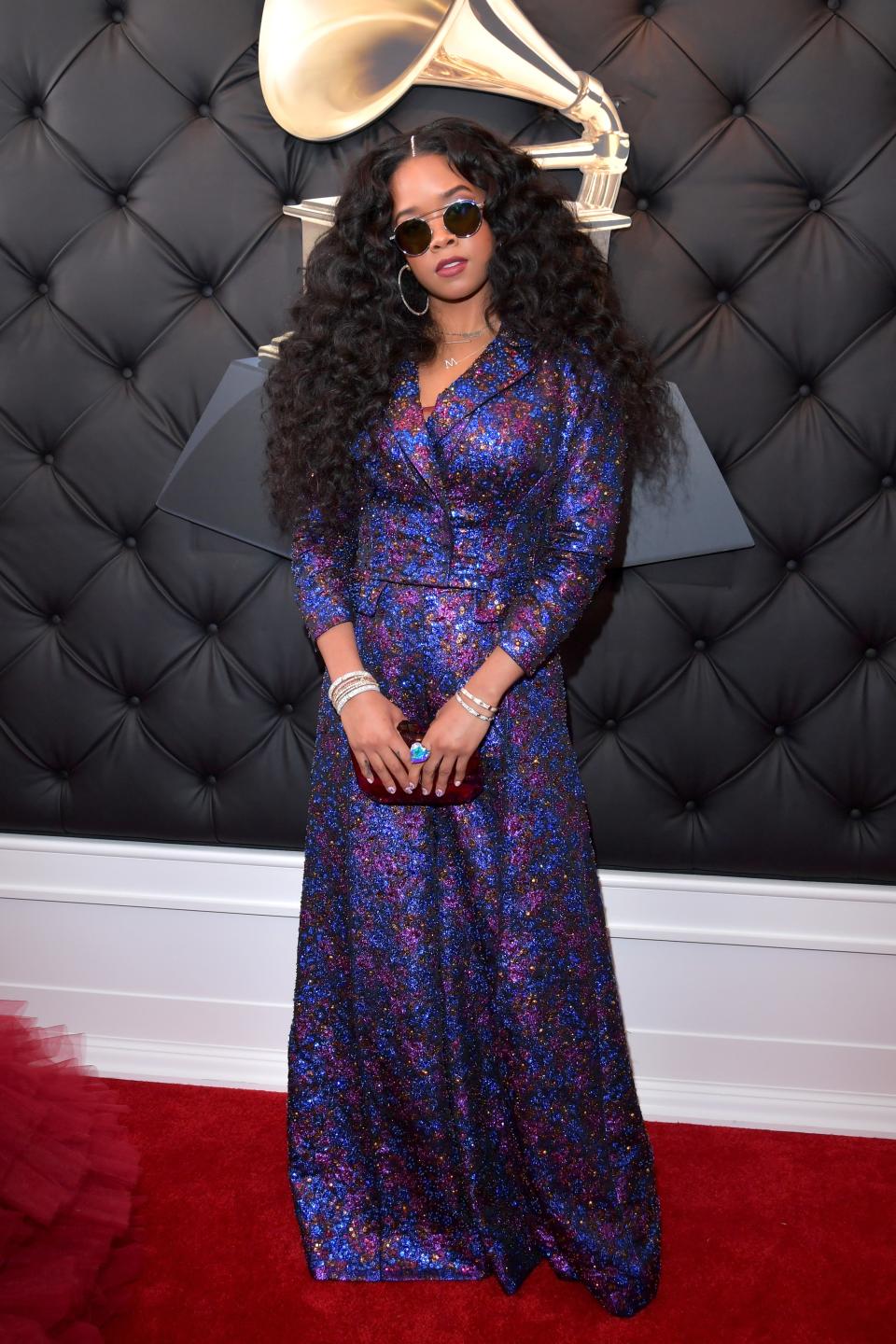 H.E.R wearing Coach