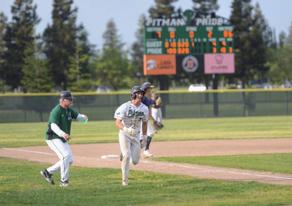 Pitman’s Ryder Scott rounds third before scoring the game tying run during a CCAL matchup with Gregori at Pitman High School in Turlock, Calif. on Wednesday, April 24, 2024.