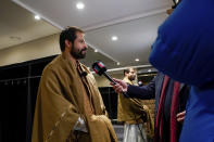 Taliban delegate Shafiullah Azam, Taliban vice director for economic cooperation ministry foreign affairs, talks to media at a hotel in Oslo, Norway, Sunday, Jan. 23, 2022. A Taliban delegation led by acting Foreign Minister Amir Khan Muttaqi on Sunday started three days of talks in Oslo with Western officials and Afghan civil society representatives amid a deteriorating humanitarian situation in Afghanistan. The closed-door meetings are taking place at a hotel in the snow-capped mountains above the Norwegian capital. (Torstein Boe/NTB scanpix via AP)