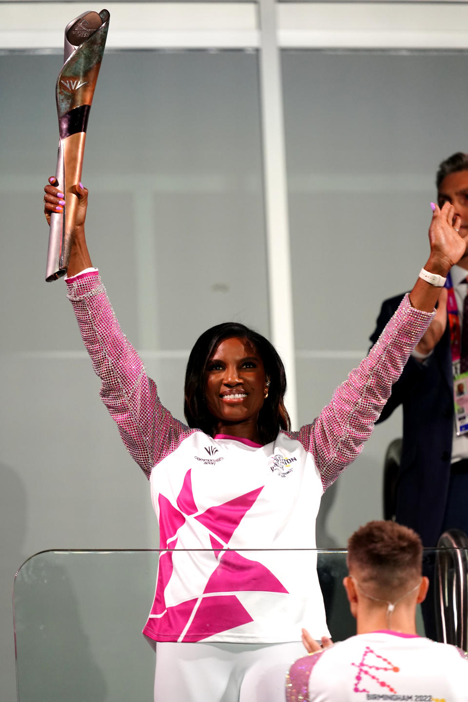 Denise Lewis OBE carries the baton during the opening ceremony of the Birmingham 2022 Commonwealth Games at the Alexander Stadium, Birmingham. Picture date: Thursday July 28, 2022.