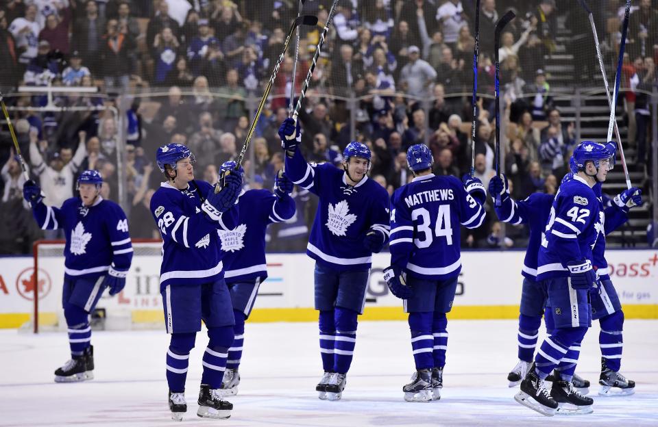 Toronto Maple Leafs salute fans following the team's NHL hockey game against the Pittsburgh Penguins in Toronto on Saturday, April 8, 2017. (Frank Gunn/The Canadian Press via AP)