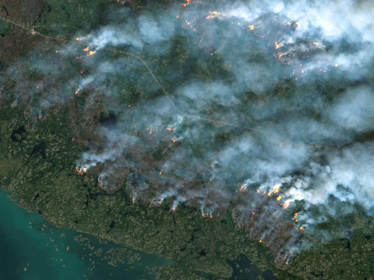 An aerial view of a forest burning in Canada's Northwest Territories.