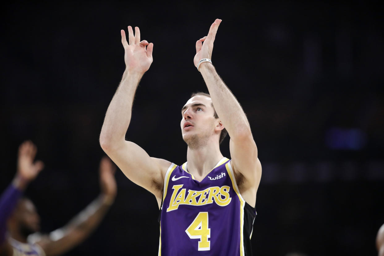 Los Angeles Lakers' Alex Caruso reacts after making a 3-point basket against the Golden State Warriors during the first half of an NBA basketball game Wednesday, Nov. 13, 2019, in Los Angeles. (AP Photo/Marcio Jose Sanchez)