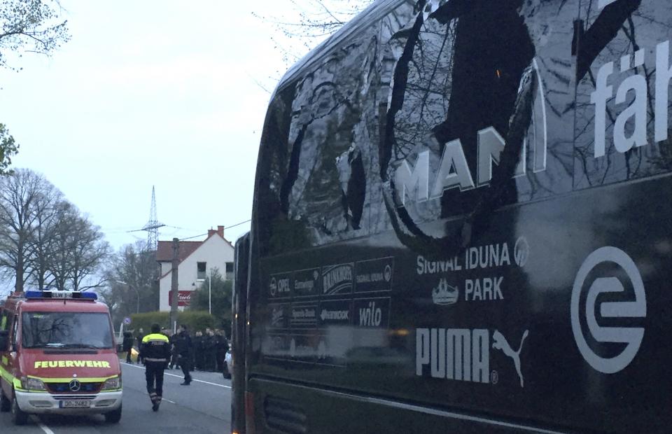 <p>A window of the bus of Borussia Dortmund is damaged after an explosion before the Champions League quarterfinal soccer match against AS Monaco in Dortmund, western Germany, Tuesday, April 11, 2017. (Carsten Linhoff/dpa via AP) </p>