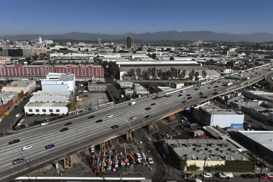 FILE - Traffic moves through the section of Interstate 10, Nov. 20, 2023, that was closed for more than a week due to an arson fire in Los Angeles. A state audit found lax oversight by California's transportation agency contributed to the destructive blaze, California authorities said Thursday, May 30, 2024. (AP Photo/Jae C. Hong,File)