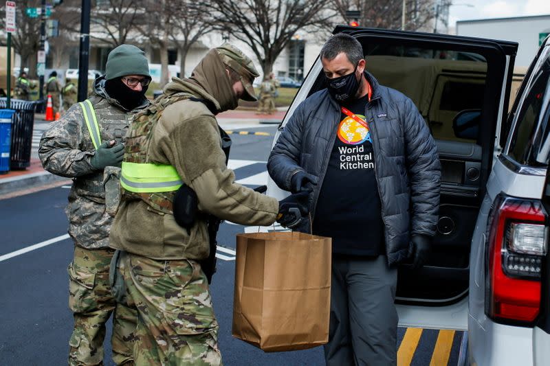 National Guard members receive food donated by World Central Kitchen ahead of U.S. President-elect Joe Biden's inauguration, in Washington