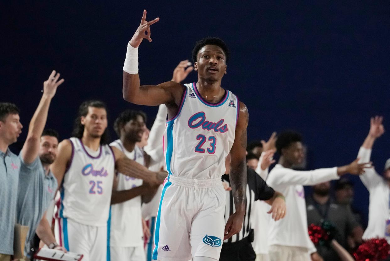 Florida Atlantic guard Brandon Weatherspoon (23) gestures after scoring a three-point basket during the second half of an NCAA college basketball game against Temple, Thursday, Feb. 15, 2024, in Boca Raton, Fla. (AP Photo/Marta Lavandier)