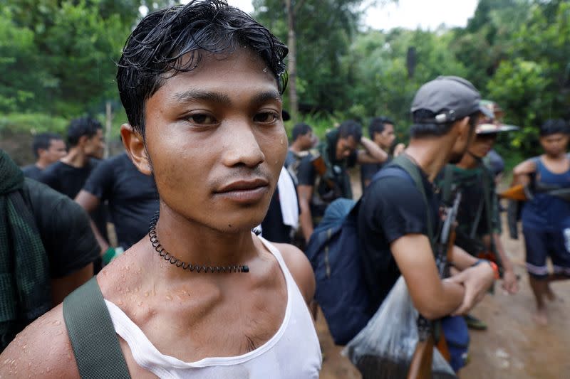 The Wider Image: In Myanmar jungle, civilians prepare to battle military rulers