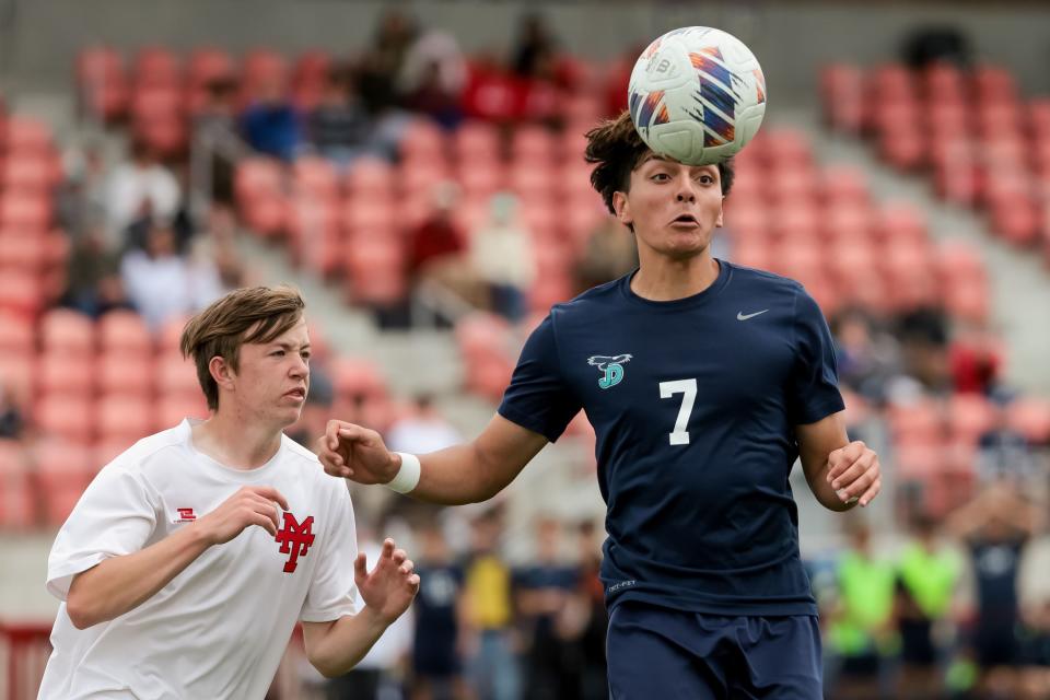 Manti’s Spencer Chidister and Juan Diego’s Jacob Alvarez chase down the ball in a 3A boys soccer state semifinal at Zions Bank Stadium in Herriman on Wednesday, May 10, 2023. | Spenser Heaps, Deseret News