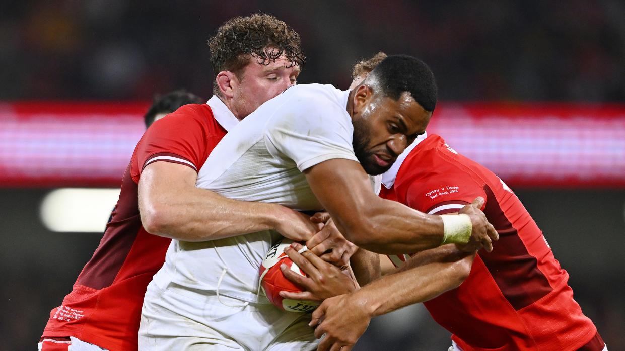  Joe Cokanasiga of England is challenged by Will Rowlands and Max Llewellyn of Wales ahead in the previous England vs Wales Summer World Cup warm-up match. 