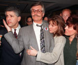 <p>Fred Goldman, center, pats the cheek of his attorney Daniel Petrocelli, left, while being hugged by his daughter Kim and wife Patti following the verdict in the wrongful death civil suit against O.J. Simpson, Tuesday, Feb. 4, 1997 in Santa Monica, Calif. Simpson was found liable for the deaths of Nicole Brown Simpson and Ronald Goldman. (Photo: Michael Caulfield/AP) </p>