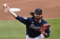 Atlanta Braves starting pitcher Bryse Wilson (46) works in the first inning of a spring training baseball game against the Boston Red Sox Saturday, March 20, 2021, in North Port, Fla. (AP Photo/John Bazemore)