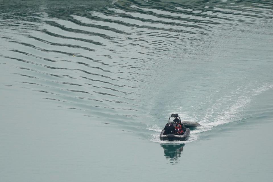 A group of people thought to be migrants being brought in to Dover, Kent (Gareth Fuller/PA) (PA Wire)