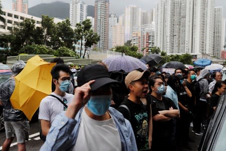 Supporters gather outside the Eastern Courts to support the arrested anti-extradition bill protesters who face rioting charges, in Hong Kong
