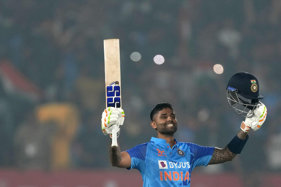 India's Suryakumar Yadav celebrates after scoring a century during the third T20 cricket match between India and Sri Lanka, in Rajkot, India, Saturday, Jan. 7, 2023. (AP Photo/Ajit Solanki)