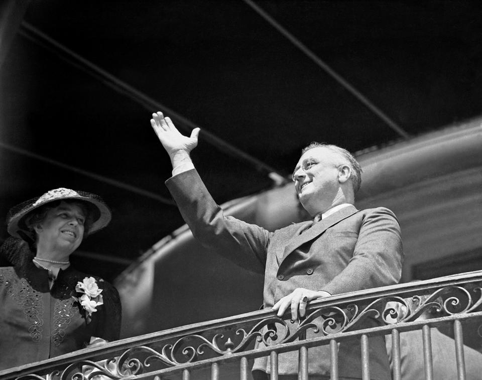 <p>President Franklin D. Roosevelt makes an appearance on the South Portico of the White House with wife Eleanor on April 10, 1939, as he cheers on children at the annual Easter Egg Roll in Washington. (Photo: AP) </p>