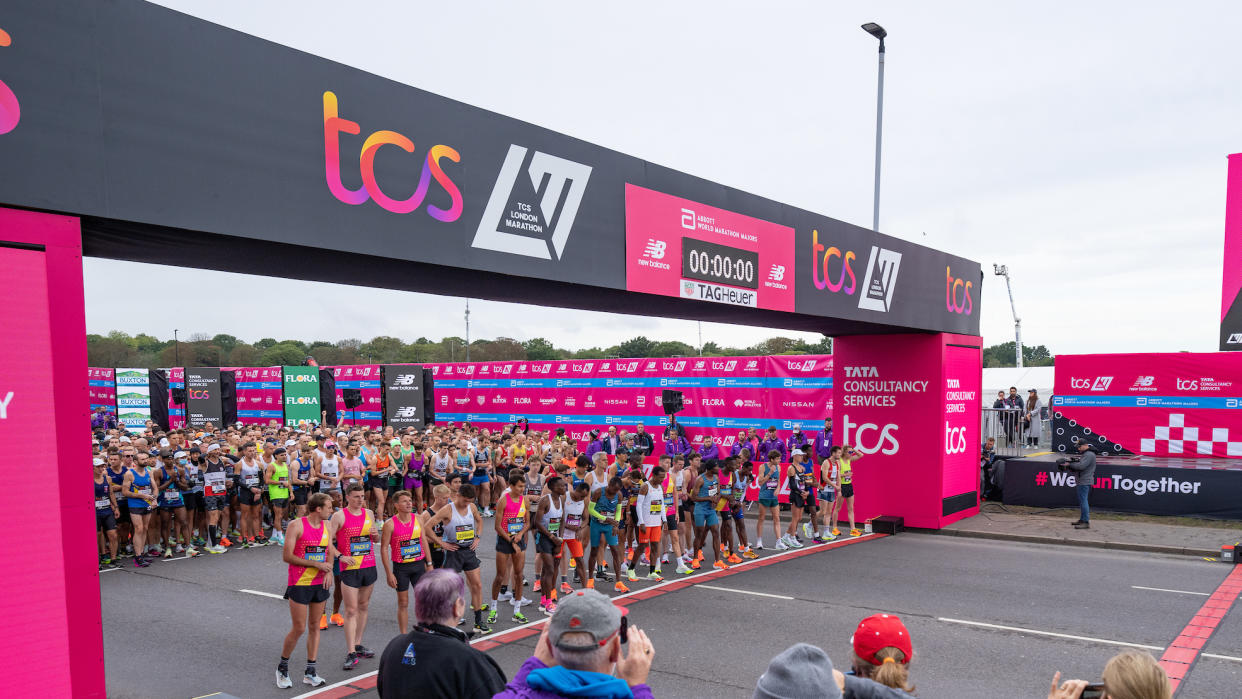  Runners lined up on 2022 London Marathon start line. 