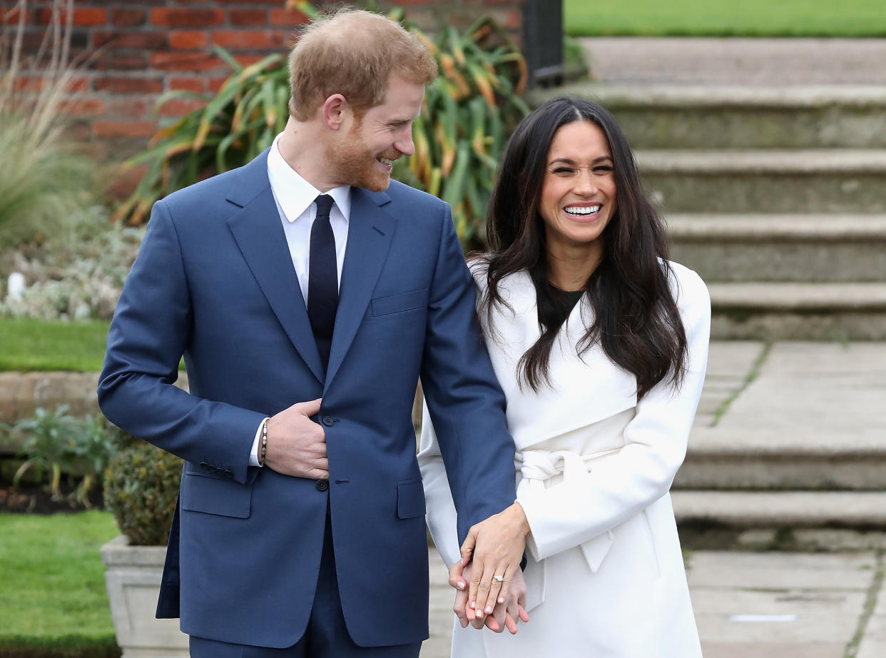 Engaged couple Prince Harry and actress Meghan Markle at the Sunken Gardens at Kensington Palace. (Photo by Chris Jackson/Getty Images)