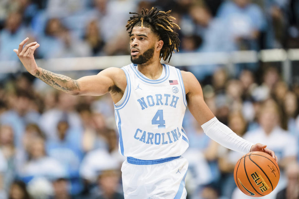 North Carolina guard R.J. Davis (4) brings the ball up court in the first half of an NCAA college basketball game against Notre Dame on Saturday, Jan. 7, 2023, in Chapel Hill, N.C. (AP Photo/Jacob Kupferman)