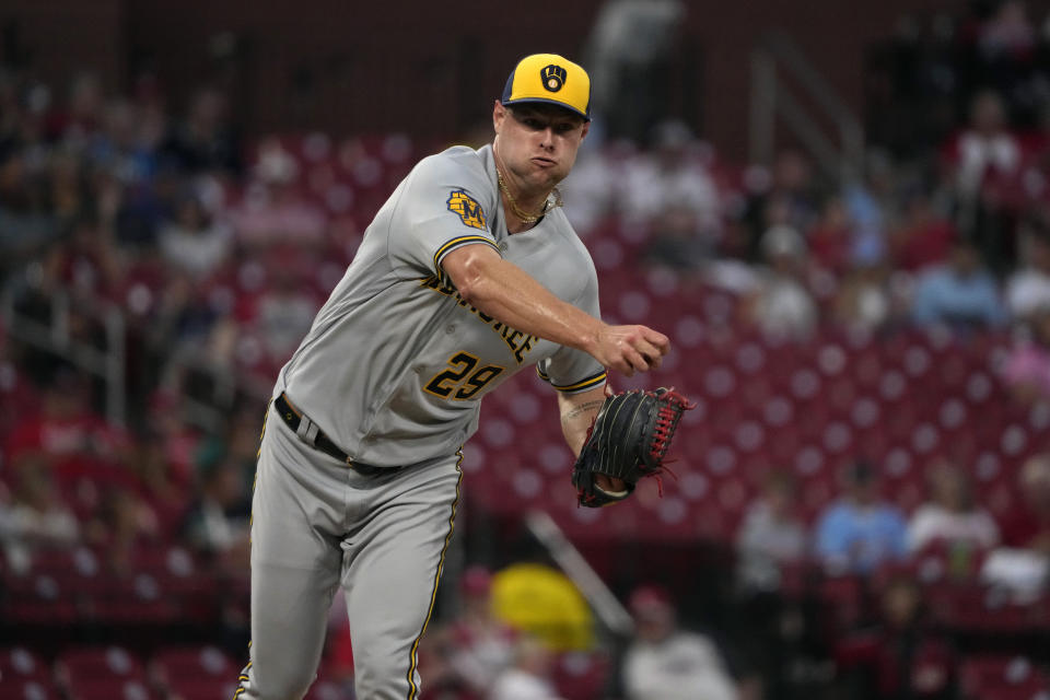 Milwaukee Brewers starting pitcher Trevor Megill throws to first during the first inning of a baseball game against the St. Louis Cardinals Tuesday, Sept. 19, 2023, in St. Louis. (AP Photo/Jeff Roberson)