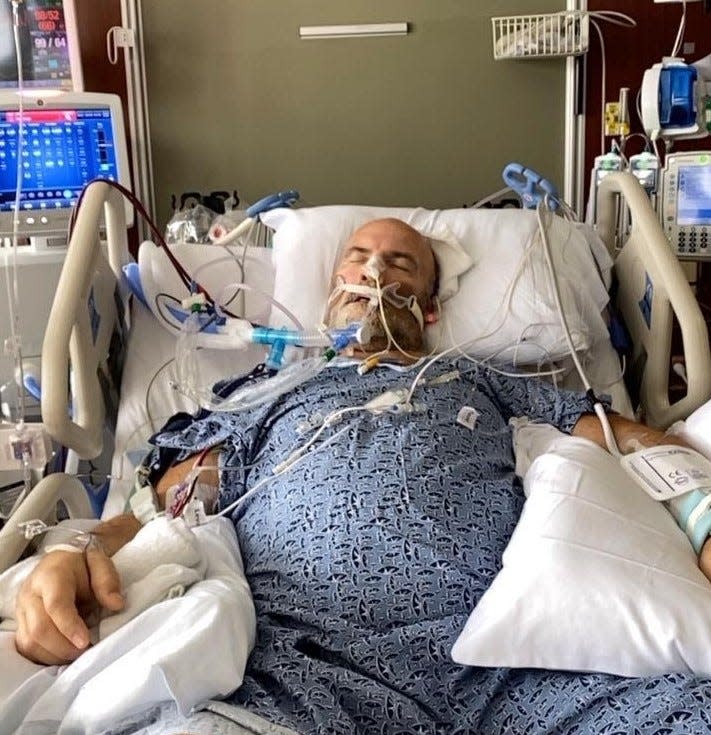 Former nursing home administrator Rick Lucas in an ICU bed battling COVID-19 on Aug. 10, the day a helicopter flew him from a Hendersonville hospital to TriStar Centennial in Nashville