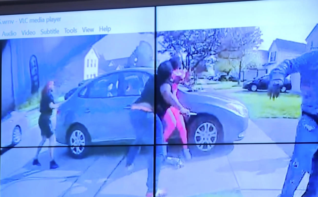 In an image from police bodycam video that the Columbus Police Department played during a news conference Tuesday night, April 20, 2021, a teenage girl, foreground, appears to wield a knife during an altercation before being shot by a police officer Tuesday, April 20, 2021, in Columbus, Ohio. Police shot and the girl just as the verdict was being announced in the trial for the killing of George Floyd. State law allows police to use deadly force to protect themselves or others, and investigators will determine whether this shooting was such an instance, Interim Police Chief Michael Woods said at the news conference. (Columbus Police Department)