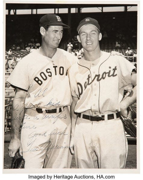 Detroit Tigers legend Al Kaline pictured with Boston Red Sox legend Ted Williams. Williams would sign a photo of the two and that photo is now being sold at auction, as of October 2021.