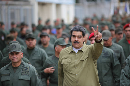 Venezuela's President Nicolas Maduro gestures during a meeting with soldiers at a military base in Caracas, Venezuela January 30, 2019. Miraflores Palace/Handout via REUTERS