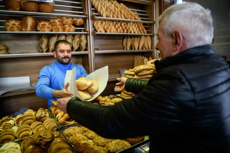 Turkey's President Erdogan has encouraged businesses to offer incentives like free meals to customers who responded to a call to buy lira and prop up the ailing national currency