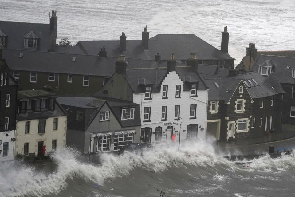 A view of waves, in Stonehaven, Scotland, Thursday, Oct. 19, 2023, as the UK braces for heavy wind and rain from Storm Babet. Hundreds of people are being evacuated from their homes and schools have closed in parts of Scotland, as much of northern Europe braces for stormy weather, heavy rain and gale-force winds from the east. (Andrew Milligan/PA via AP)