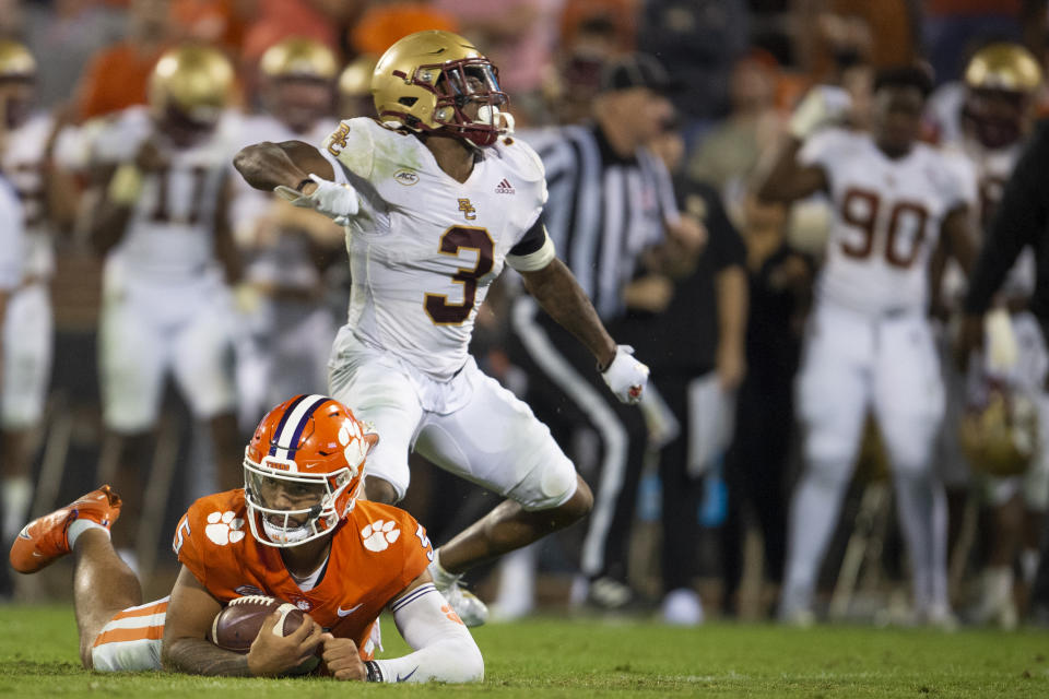 Boston College defensive back Jason Maitre (3) reacts after sacking Clemson quarterback D.J. Uiagalelei (5) during the second half of an NCAA college football game Saturday, Oct. 2, 2021, in Clemson, S.C. (AP Photo/Hakim Wright Sr.)