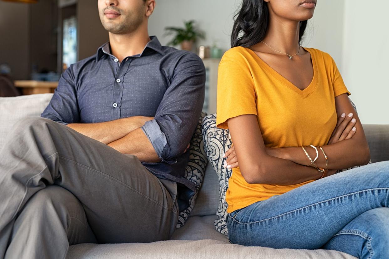 couple angry with backs toward each other