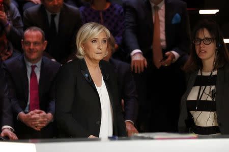 Candidate for the 2017 presidential election Marine Le Pen, French National Front (FN) political party leader, arrives for a debate organised by French private TV channel TF1 in Aubervilliers, outside Paris, France, March 20, 2017. REUTERS/Patrick Kovarik/Pool