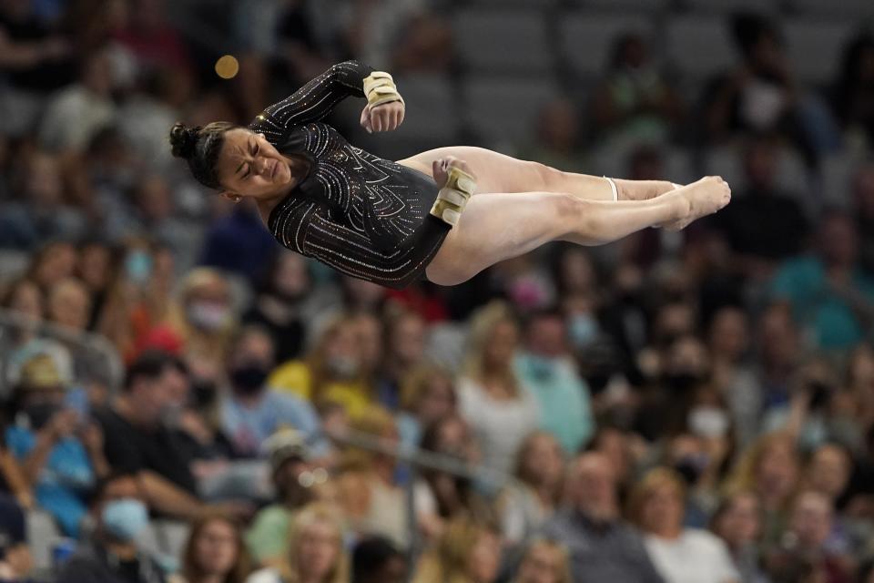 Sunisa Lee competes on the vault during the U.S. Gymnastics Championships, Sunday, June 6, 2021, in Fort Worth, Texas. (AP Photo/Tony Gutierrez)