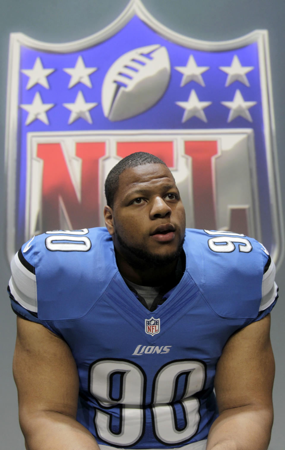 Detroit Lions' Ndamukong Suh talks to a reporter during a presentation in New York, Tuesday, April 3, 2012. The NFL and Nike showed off the new gear in grand style with a gridiron-themed fashion show at a Brooklyn film studio.(AP Photo/Seth Wenig)