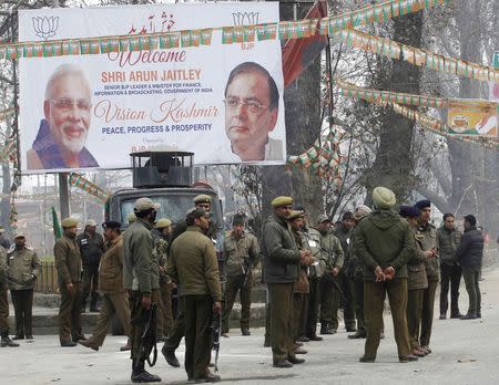 Indian police stand guard outside the venue of an election campaign rally addressed by Prime Minister Narendra Modi in Srinagar December 8, 2014. REUTERS/Danish Ismail