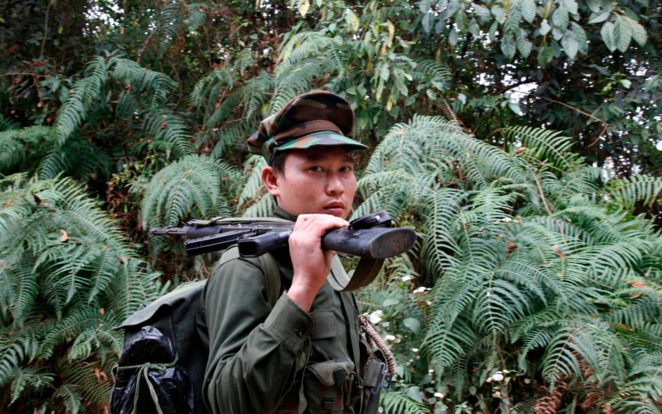 A Kachin Independent Army fighter in northern Kachin state - Esther Htusan/AP