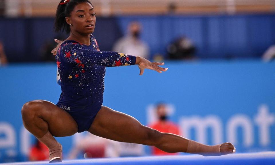 Simone Biles competes in the floor event of the artistic gymnastic women’s qualification during the Tokyo 2020 Olympic Games at the Ariake Gymnastics Centre in Tokyo.