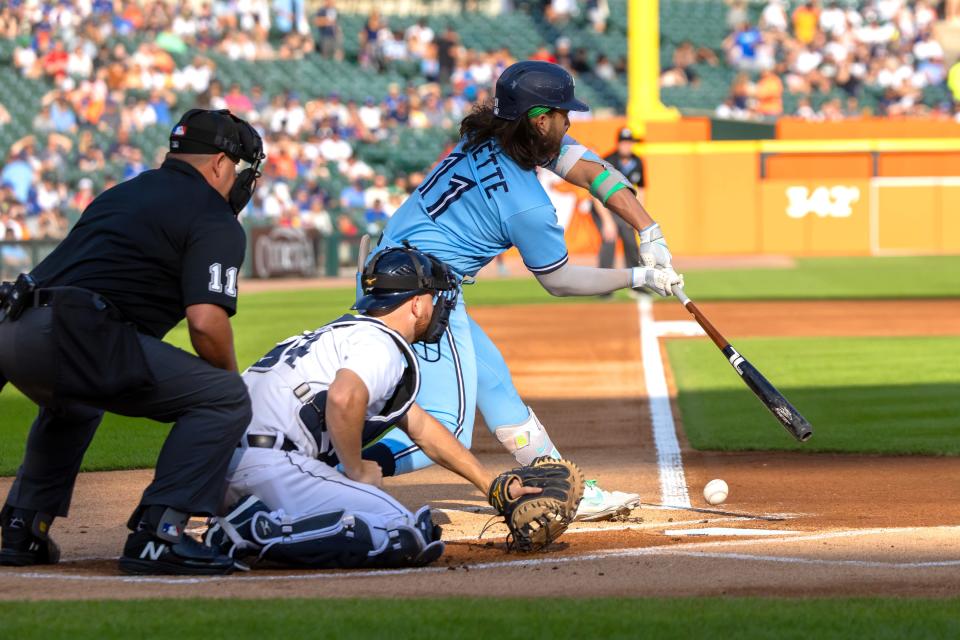 Toronto Blue Jays shortstop Bo Bichette (11) strikes out on a check swing in the first inning against the Detroit Tigers at Comerica Park in Detroit on July 7, 2023.