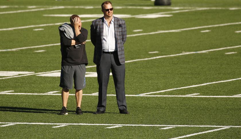 WESTWOOD, CA - MARCH 06, 2018 - Josh Rebholz, right, serves as Senior Associate Athletic Director for External Relations at UCLA on the Spaulding practice field on the UCLA Westwood campus Tuesday morning March 6, 2018 for the start of Spring football. (Al Seib / Los Angeles Times)