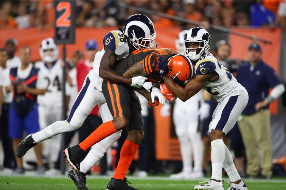 CLEVELAND, OHIO - SEPTEMBER 22: Tight end Ricky Seals-Jones #83 of the Cleveland Browns is tackled by inside linebacker Cory Littleton #58 and cornerback Marcus Peters #22 of the Los Angeles Rams during the second quarter of the game at FirstEnergy Stadium on September 22, 2019 in Cleveland, Ohio. (Photo by Gregory Shamus/Getty Images)